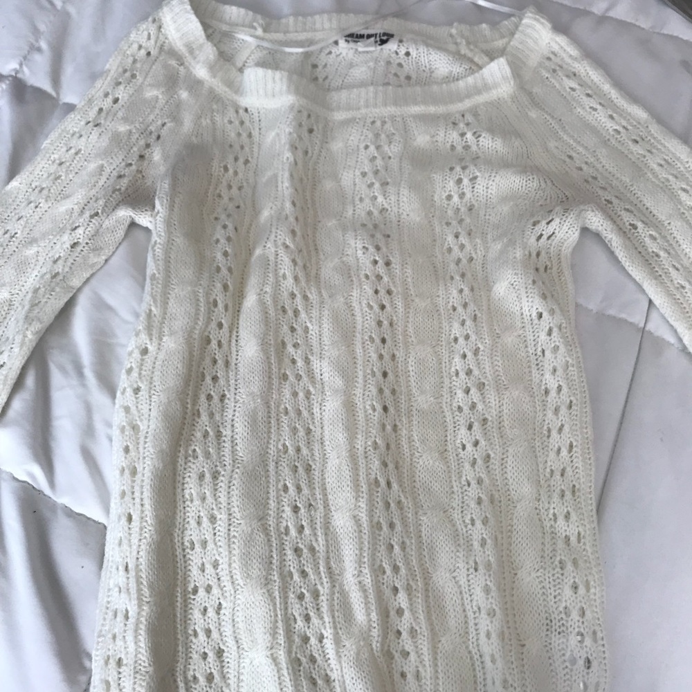 Two white sweaters